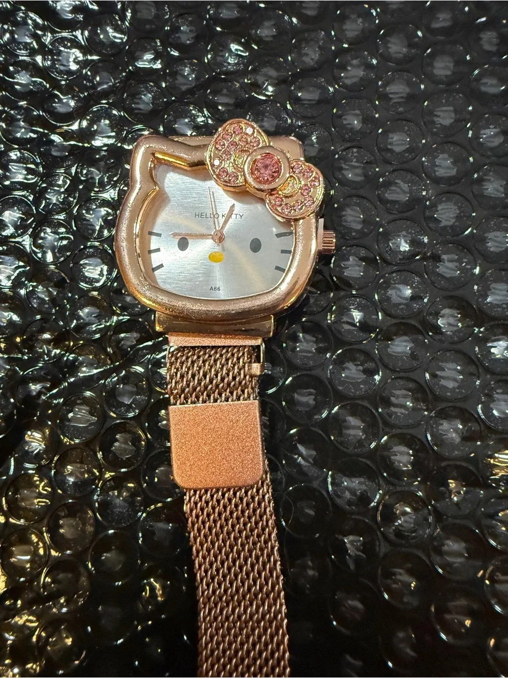 Hello Kitty Rose Gold Tone Mesh Watch with Crystal Bow Accent